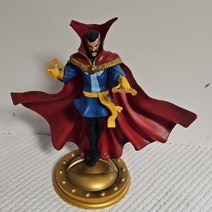 Red and Blue Superhero Figurine